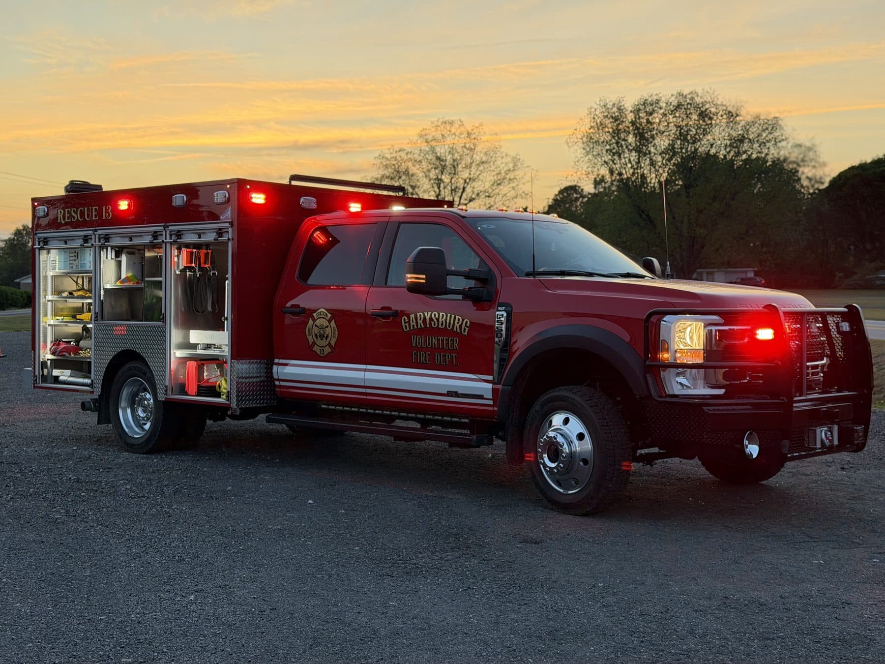Garysburg Rescue 13 vehicle with emergency lights and rescue compartments open